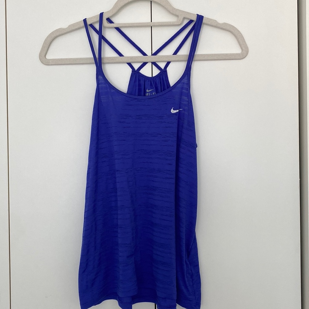 Nike Dri-Fit tank. Crisscross back detail. Moderate wear. Size small.